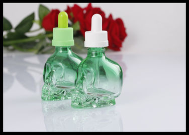 China do suco líquido de vidro da garrafa E E do conta-gotas da forma do crânio 30ml garrafa de vidro fornecedor