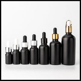 China Cosmético geado preto das garrafas de vidro de óleo essencial da cor que empacota a forma redonda fornecedor