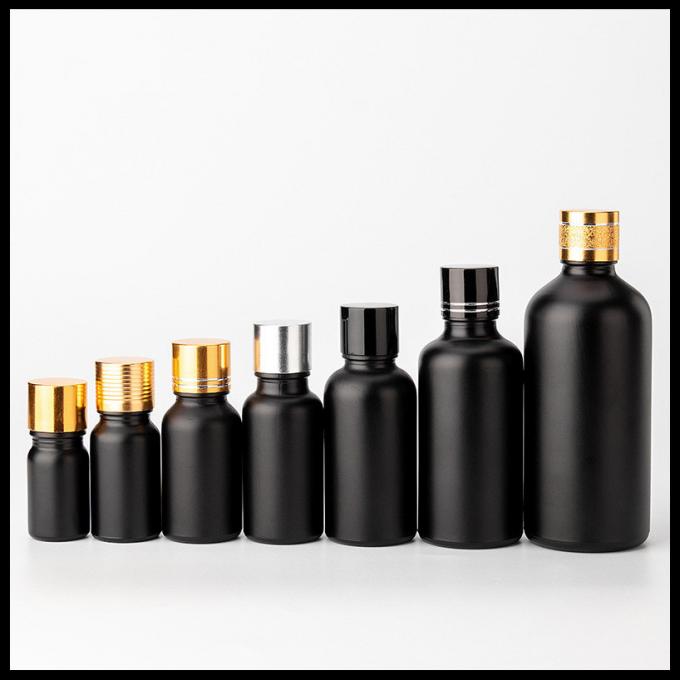 Cosmético geado preto das garrafas de vidro de óleo essencial da cor que empacota a forma redonda